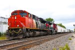 CN 8818 Noodle-Less Nose, Spray-Painted Locomotive Number a la early Conrail, and a friendly wave from the Conductor